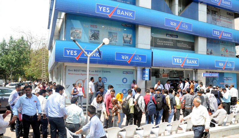 Depositors gathered outside Yes Bank branch in Ahmedabad for money withdrawal