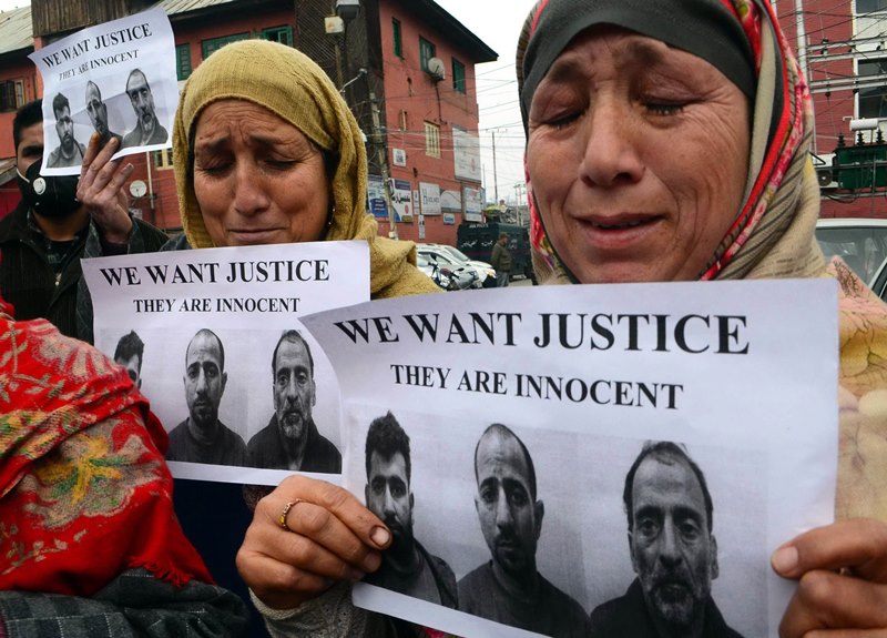 Family members of men arrested by Delhi Police protest in Srinagar