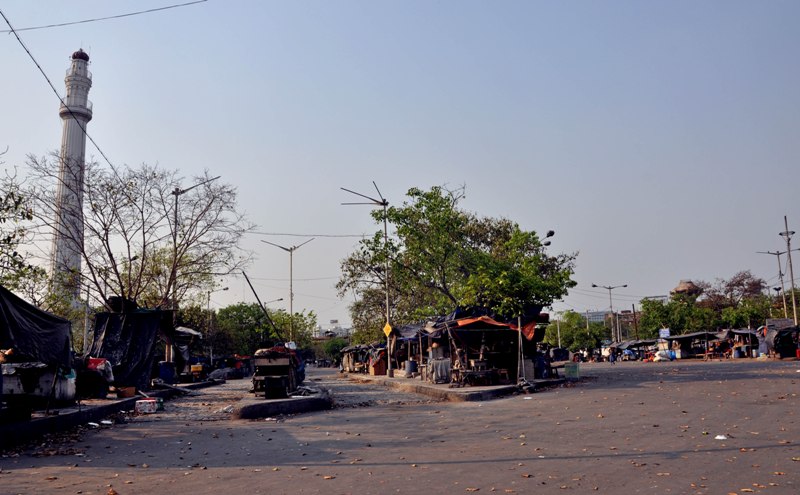 Kolkata in Lockdown: Deserted streets of downtown area and people in markets