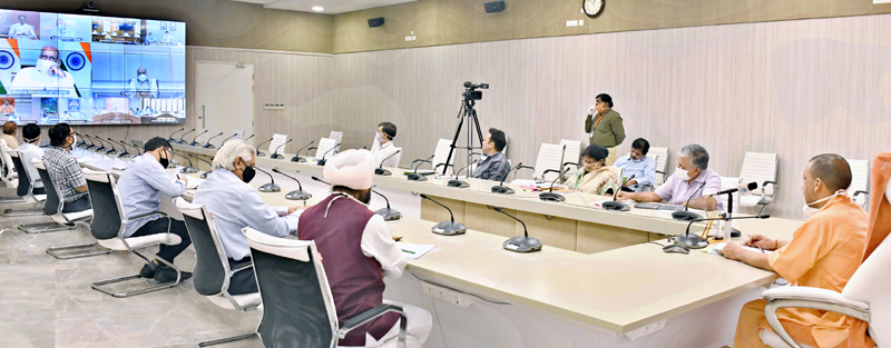 Prime Minister Narendra Modi interacing with Uttar Pradesh Chief Minister Yogi Aditiyanath