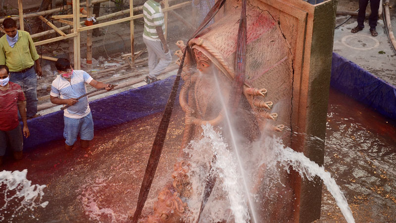 Unique Durga idol immersion in Kolkata by Tridhara Sammilani
