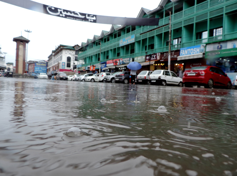 People walking down the Lal Chowk in Srinagar