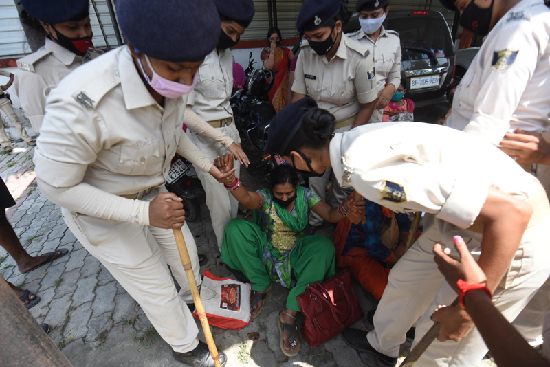 Police arresting contract based Revised Auxiliary Nursing Midwifery in Patna