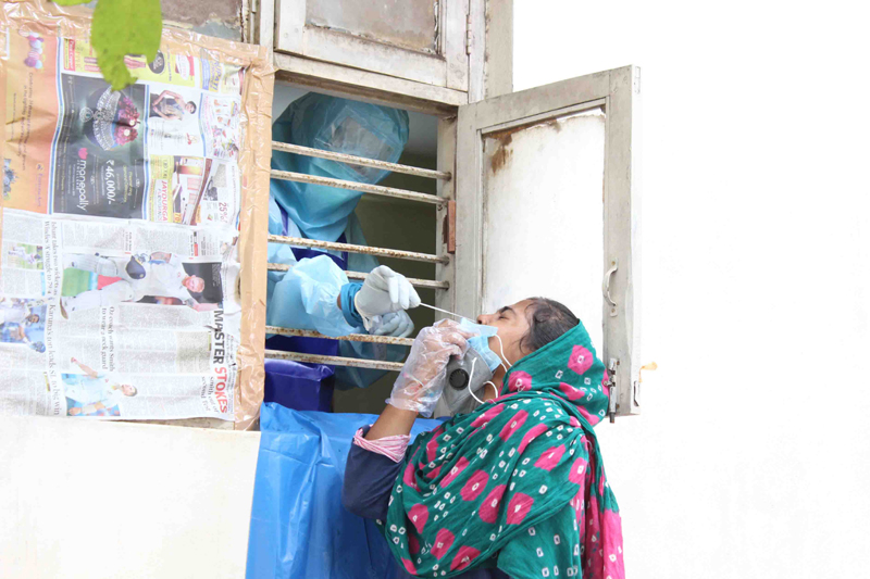Health workers taking swabs for Covid-19 test in Secunderabad,Telangana