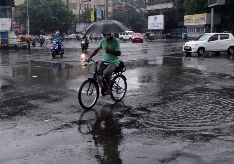 Glimpses of rain splashed Kolkata roads