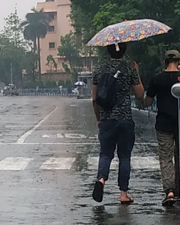 Glimpses of rain splashed Kolkata roads