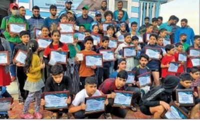 Swim N Survive Society with Tourism Department, Kashmir awards swimmers