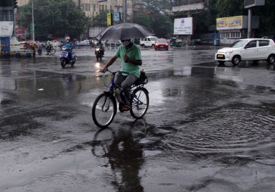 Glimpses of rain splashed Kolkata roads