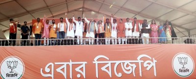 Amit Shah waves at the crowd in election rally in West Bengal