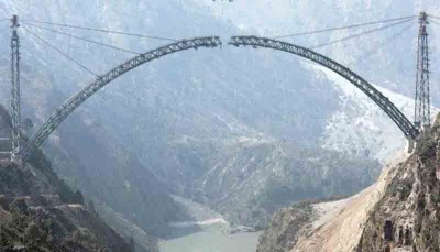 Lower ends of arch of world's highest railway bridge in Jammu and Kashmir connected