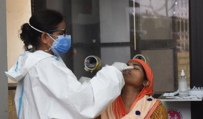 India reports 34,403 new COVID-19 cases in 24 hours