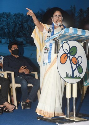 Mamata Banerjee meets a family during her visit in Goa