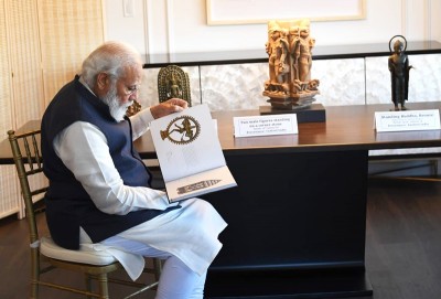 Glimpse of PM Modi reviewing artifacts and antiquities which he is bringing back to India from US