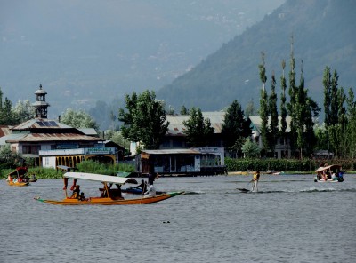 A tourist enjoying water skiing in Kashmir's Dal Lake