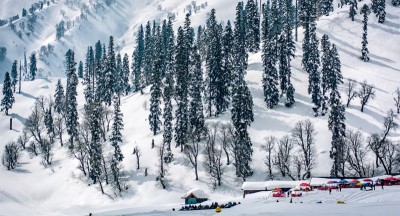 Tourists enjoy snow in Jammu and Kashmir's DKG