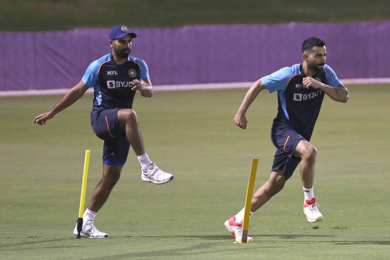 Ravi Shastri with Rohit Sharma during practice session in Dubai