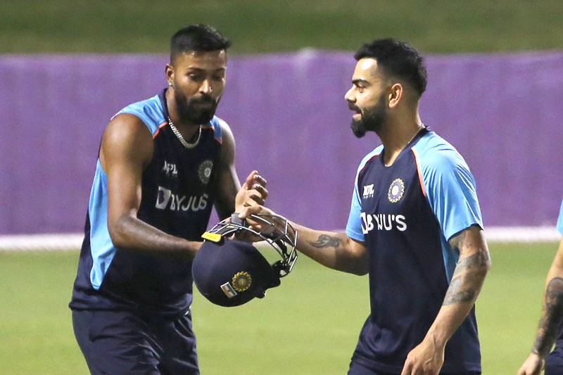 Ravi Shastri with Rohit Sharma during practice session in Dubai