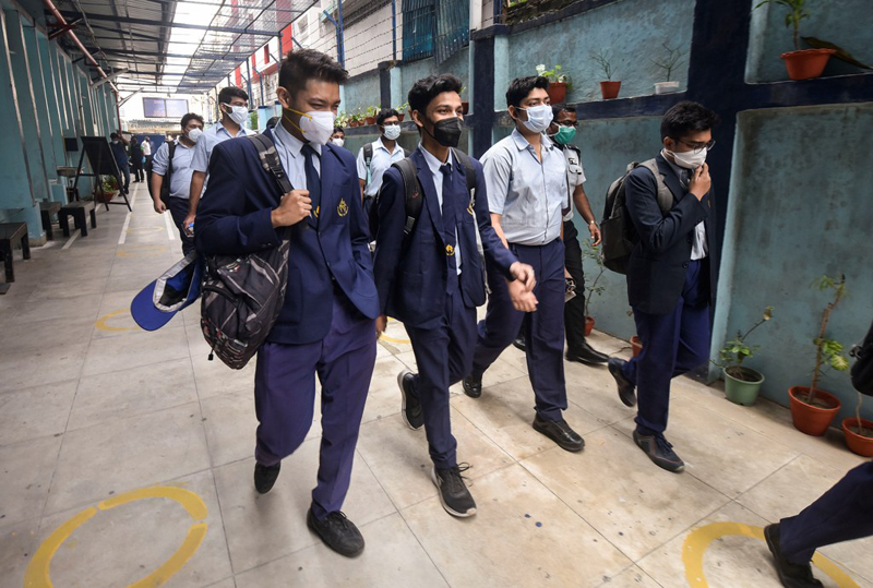 Glimpses of students attending physical classes in Kolkata as West Bengal schools reopen from today