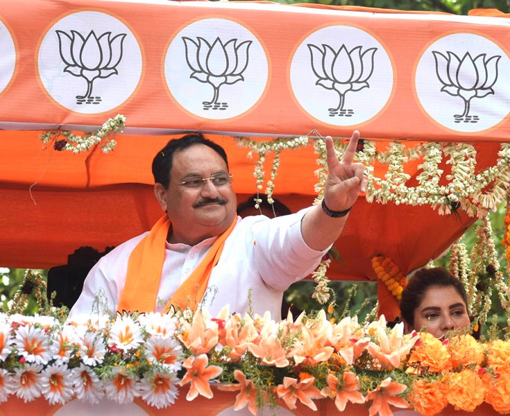 J P Nadda waving supporters during road show for Babul Supriyo in Kolkata