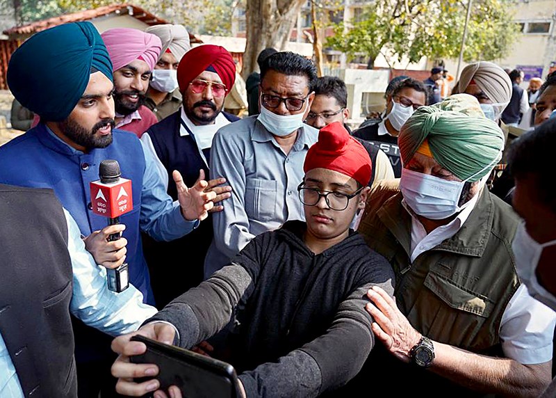 Punjab polls: People wait in queue to cast their votes