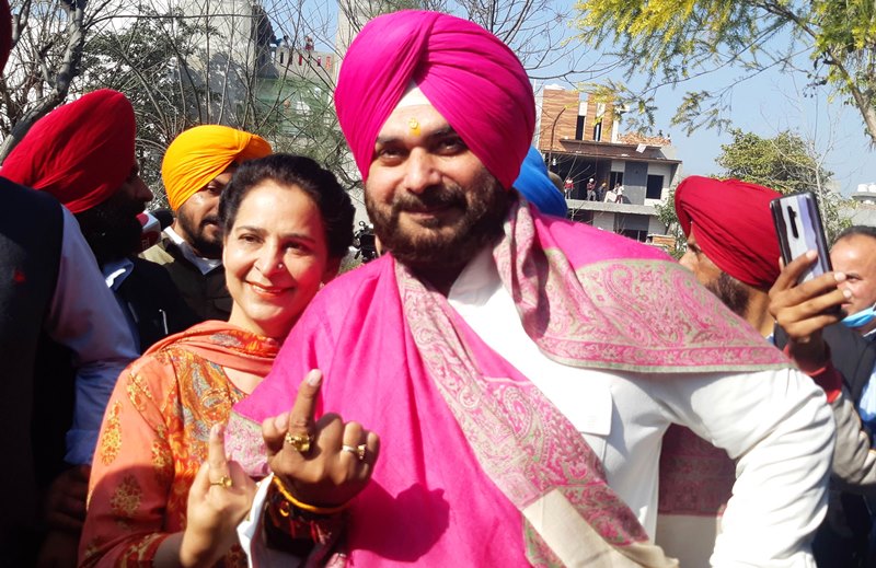 Punjab polls: People wait in queue to cast their votes