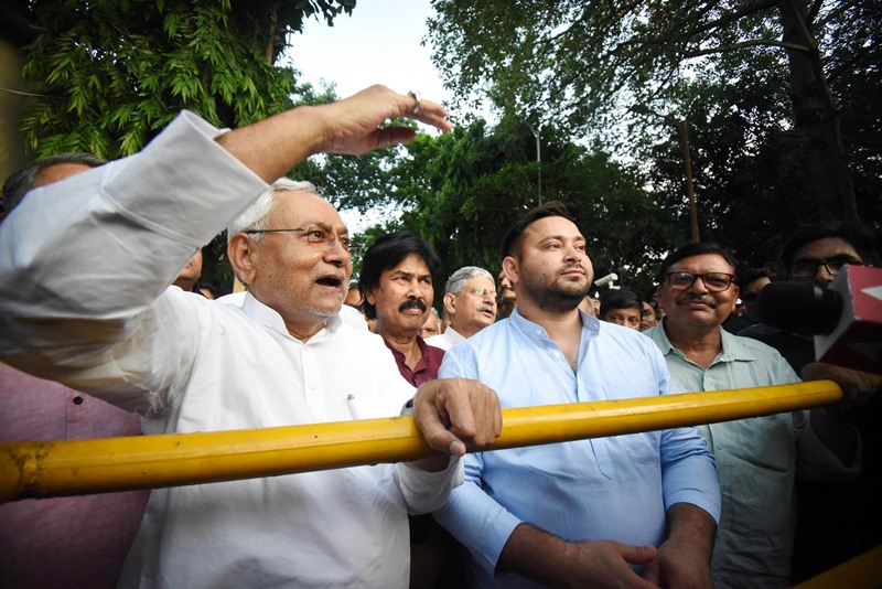 Nitish Kumar along with Tejashwi Yadav outside Raj Bhawan in Patna
