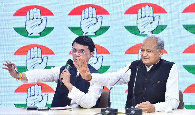 Rajasthan CM Ashok Gehlot addresses a press conference with Cong leader Pawan Khera
