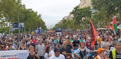 Demonstrators target tourists with water pistols during anti-mass tourism protests in Barcelona