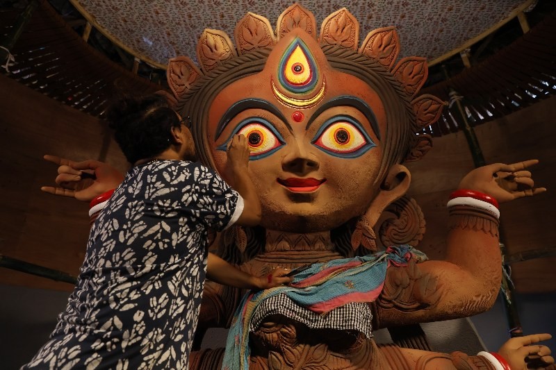 In Images: Sanatan Dinda gives finishing touches to Durga idol in Kolkata