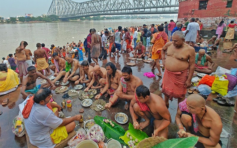 In Images: Kolkata Marks Mahalaya with Hooghly Tarpan and Durga's Chokkhudan