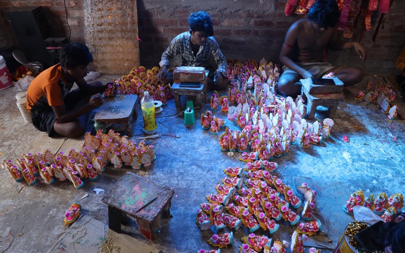 In Images: Kolkata readies for Diwali with idols and earthen lamps
