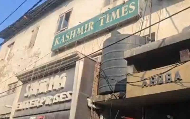 Kashmir Times faces police raids and allegations of anti-national activities, prompting strong condemnation from its editors.