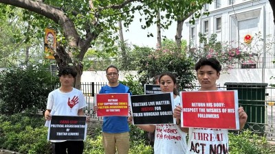 Tibetan Youth Congress members protest outside Chinese Embassy in New Delhi over Buddhist leader's death