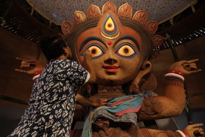 In Images: Sanatan Dinda gives finishing touches to Durga idol in Kolkata