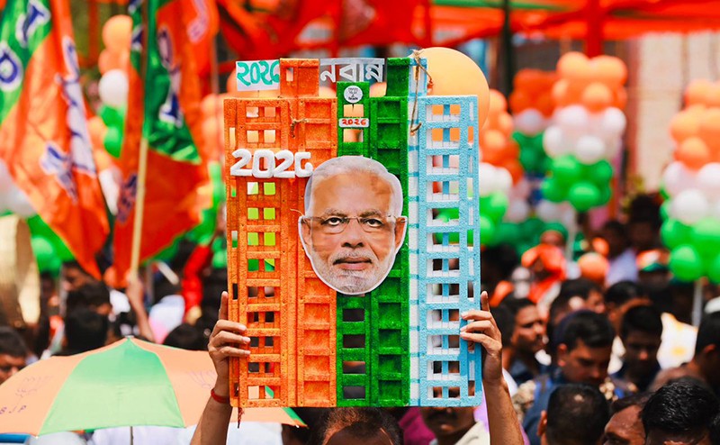 In Images: Amit Shah holds roadshow for BJP candidates in Kolkata