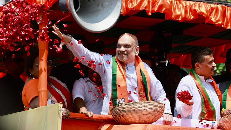 In Images: Amit Shah holds roadshow for BJP candidates in Kolkata