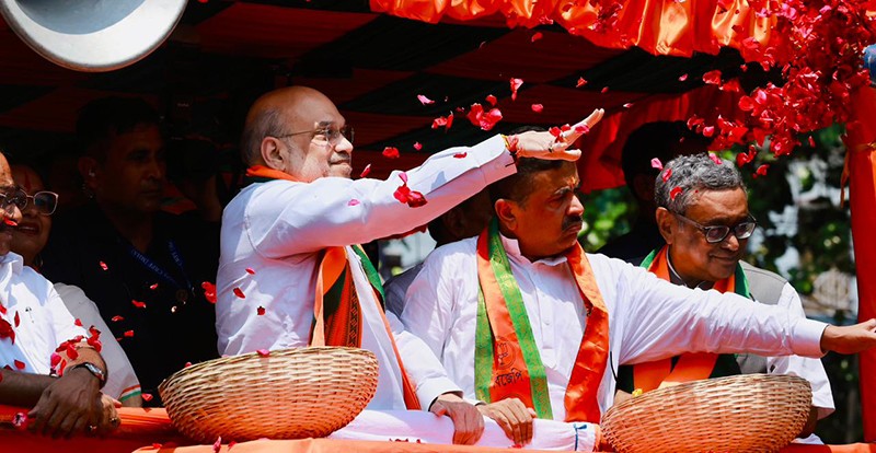 In Images: Amit Shah holds roadshow for BJP candidates in Kolkata