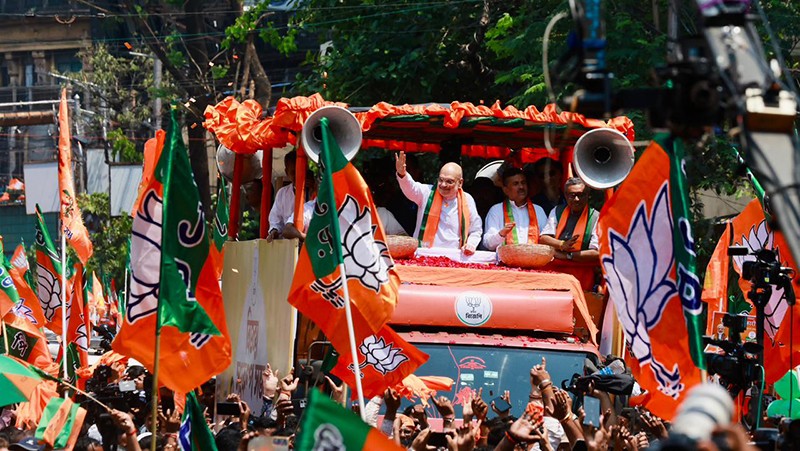 In Images: Amit Shah holds roadshow for BJP candidates in Kolkata