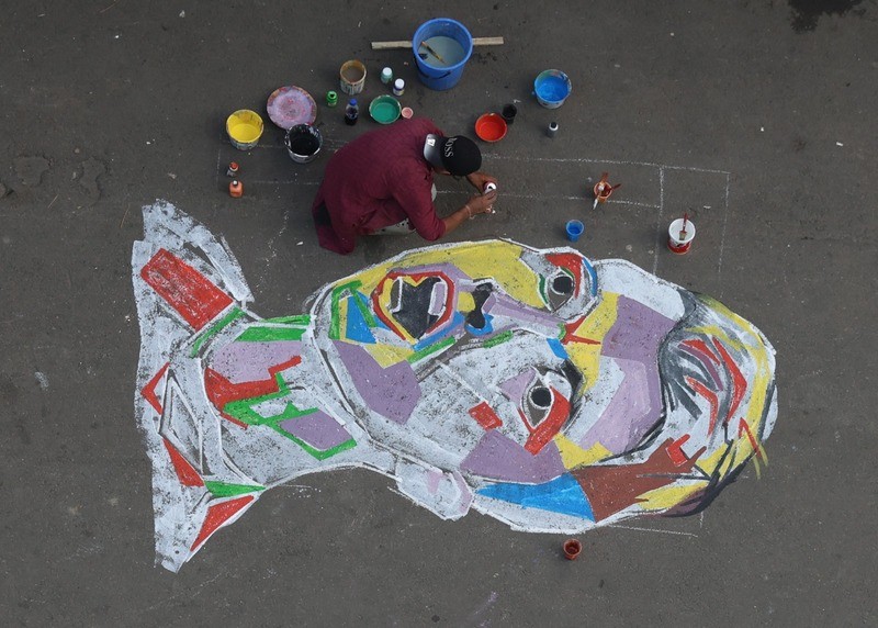 In Images: Kolkata artist celebrates global football icons with vibrant street murals