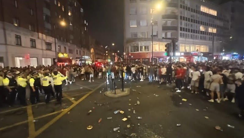 Violence erupted in London after France defeated Morocco, leaving a police officer injured.