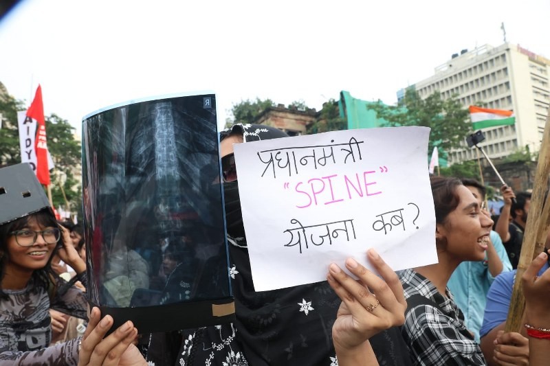 In Images: CJP, SFI supporters rally in Kolkata, demand Pradhan's resignation