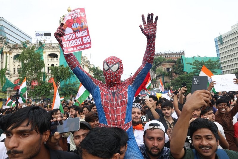In Images: CJP, SFI supporters rally in Kolkata, demand Pradhan's resignation