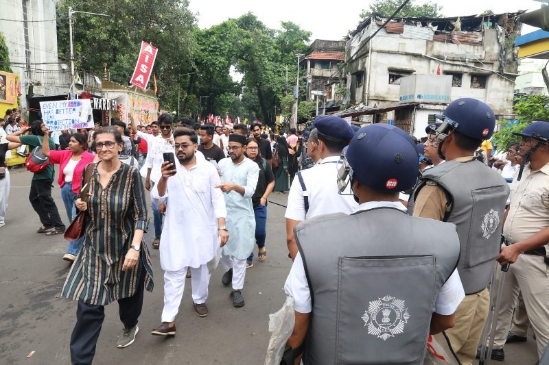 In Images: CJP, SFI supporters rally in Kolkata, demand Pradhan's resignation