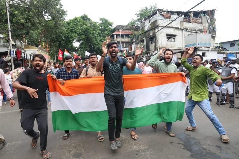 In Images: CJP, SFI supporters rally in Kolkata, demand Pradhan's resignation