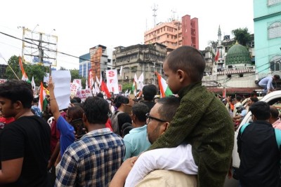 In Images: CJP, SFI supporters rally in Kolkata, demand Pradhan's resignation